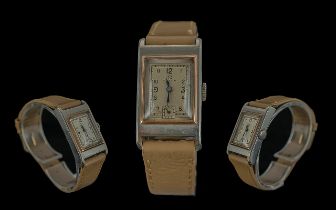 Omega 1930s Steel Cased Rectangular Mechanical Wrist Watch with subsidiary dial, all aspects of