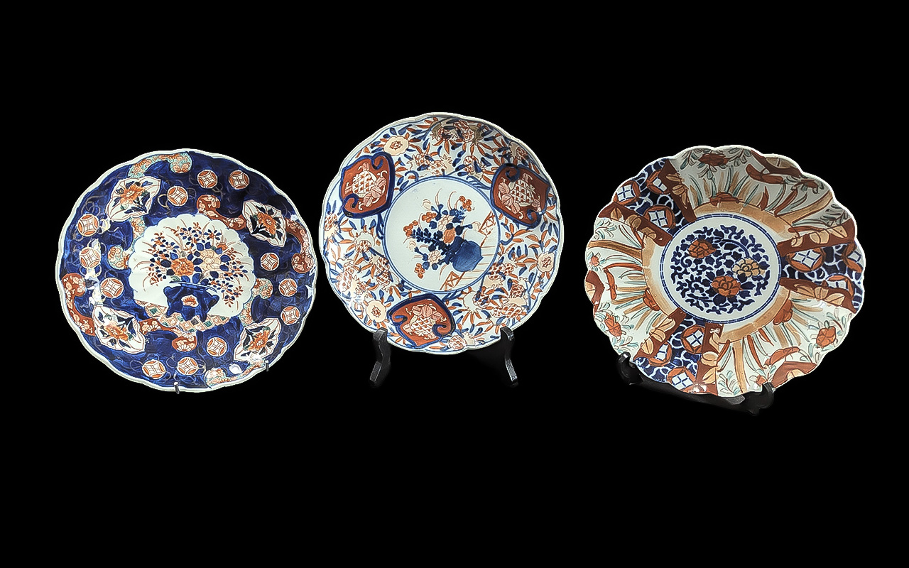 Three Japanese Large 'Imari' design Plates/Shallow Bowls, with scalloped edges. Approx 8.5''