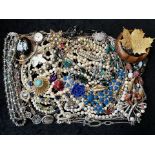 A Collection of Vintage Costume Jewellery to include necklaces, pearls, brooches, gold tone