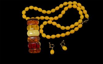Set of Butterscotch Amber Style Coloured Beads, together with a matching pair of earrings and an