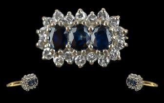 Ladies 18ct Gold Pleasing Sapphire and Diamond Set Ring, full hallmark to interior of shank 750-