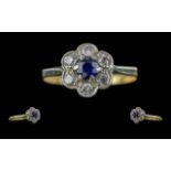 Ladies Pleasing and Petite 18ct Gold Diamond Set Cluster Ring, flower head setting, marked 750 to