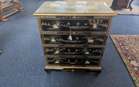 Oriental Style Chinoiserie Decorated Chest of Drawers, black lacquer with gilt highlights with