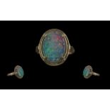 Ladies Attractive 14ct Gold Single Stone Opal Set Ring, marked 14ct to shank, the large,