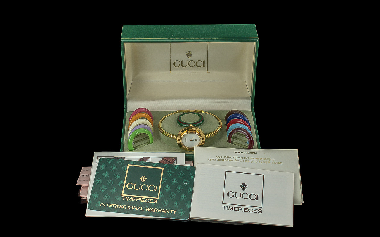 Gucci Timepieces Multi Bezel Ladies Watch. Gold Tone Colour, Comes with ( 11 ) Multi Coloured