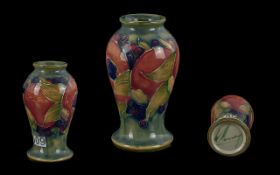 William Moorcroft Signed Small Baluster Vase ' Ochre Pomegranate ' Design. c.1920's. Signed to Base.