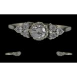 18ct White Gold Pleasing Diamond Set Ring. Full Hallmark to Interior of Shank. The Central Round