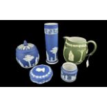 Collection of Wedgwood, comprising Dark Blue Jasper biscuit barrel, lidded trinket box, tall 10''