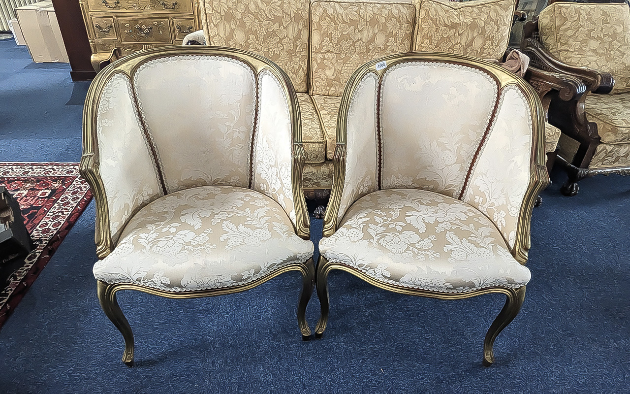 Pair of French Style Salon Tub Chairs, gilt painted frame, cream damask upholstery.