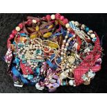 Box of Vintage Costume Jewellery, comprising assorted beads, pearls, necklaces, bracelets, etc.