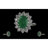 Ladies - Pleasing Quality 18ct White Gold Emerald and Diamond Set Cluster Ring.