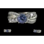 Ladies 14ct White Gold Tanzanite and Diamond Set Dress Ring. Marked 14ct to Interior of Shank. The