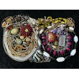 A Collection of Vintage Costume Jewellery to include necklaces, pearls, brooches, gold tone