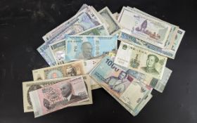 A Group of Assorted World Banknotes. To include Indonesia, India, Argentina, Vietnam, Barbardos,