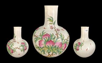 Chinese Vase with peach and bat decoration, globular shape with neck, 9'' high.