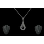 Ladies - Excellent 18ct White Gold Diamond Set Pendant Attached to a 18ct White Gold Chain. The 24