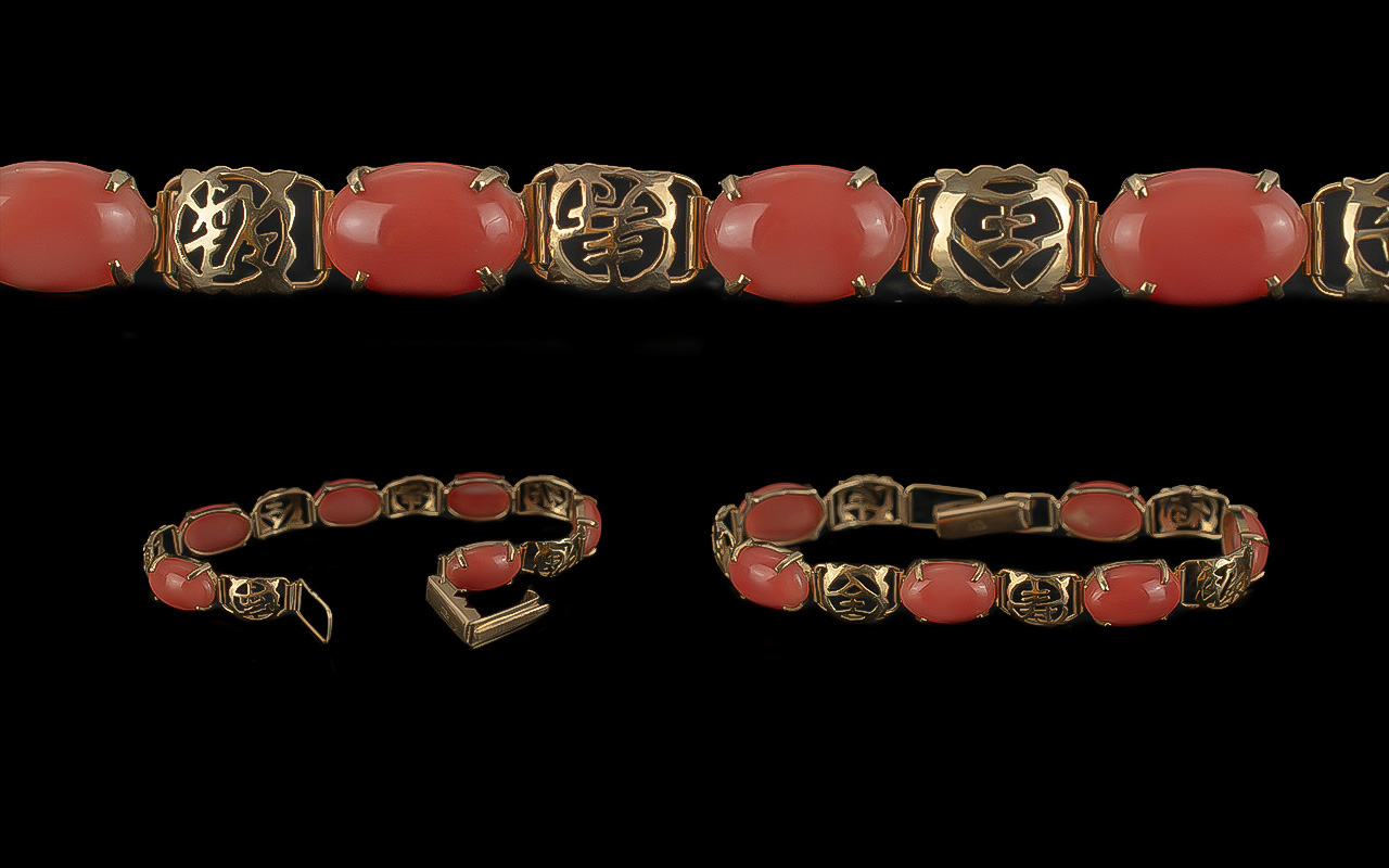 Ladies Fine Quality 18ct Gold Coral Set Bracelet. Marked 18ct. The Six Well Matched Cabochon Cut