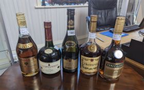 Collection of Five Bottles of Brandy, to include Hennessy Cocnac, Three Barrels, Couvoisier