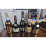 Collection of Five Bottles of Brandy, to include Hennessy Cocnac, Three Barrels, Couvoisier