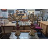 A Pair of Brass & Red Six Branch Candelabra, stand at 21'' high, a brass ornate base with a red