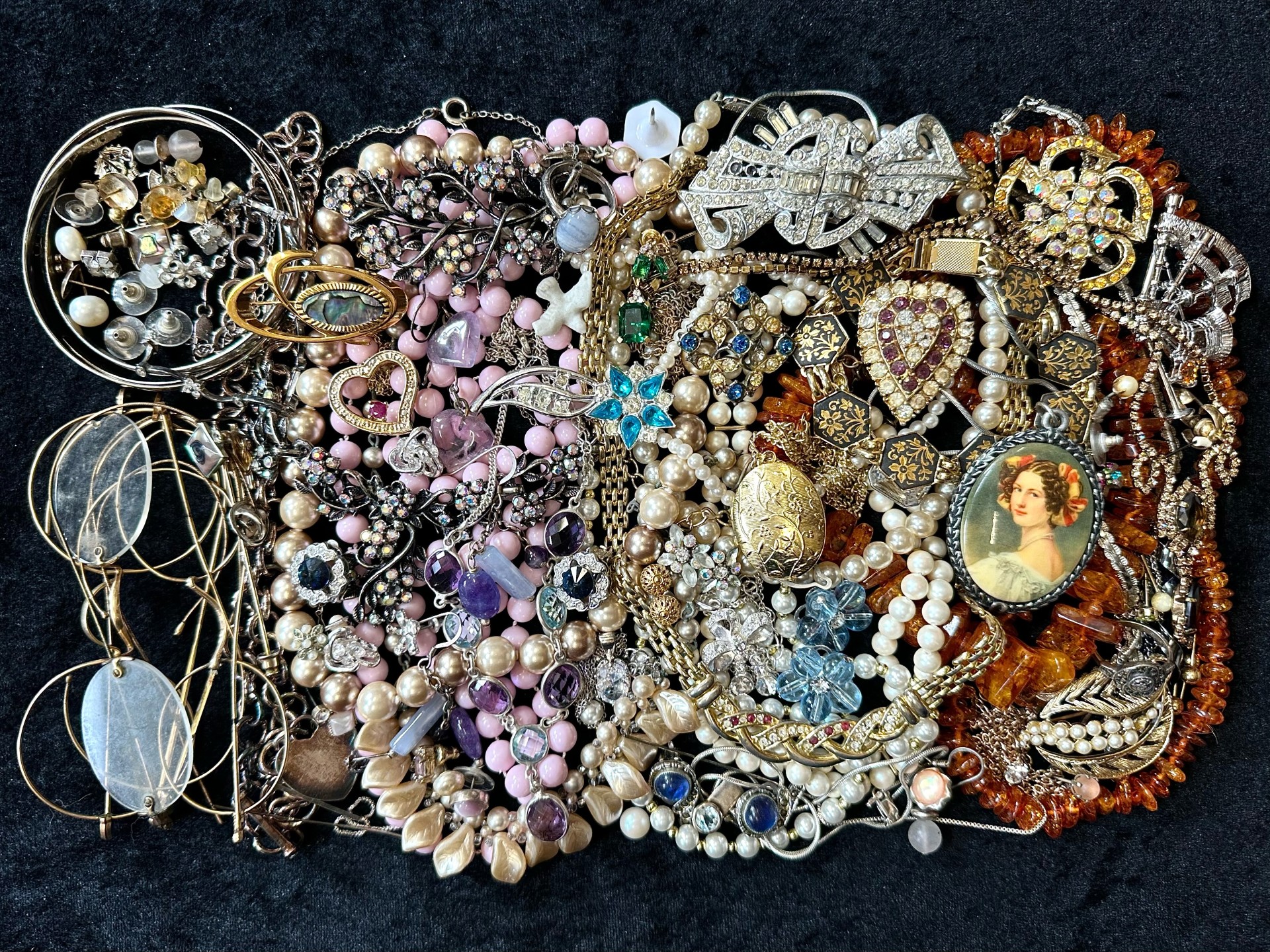 Box of Quality Costume Jewellery, comprising mainly chains, beads and bangles includes some Baltic