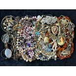 Box of Quality Costume Jewellery, comprising mainly chains, beads and bangles includes some Baltic