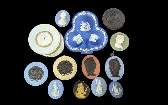 Collection of Wedgwood Cameos, assorted colours and styles, 11 in total, together with a clock