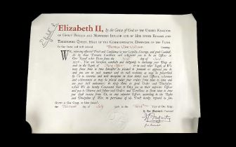 Queen Elizabeth II Signed Parchment, rolled, appointing Thomas Clive Gillison to the position of