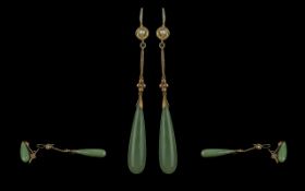 Chinese 1950s Pair of 14ct Gold Teardrop Jade Earrings, testing 14ct gold, the elongated pair of