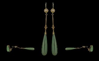 Chinese 1950s Pair of 14ct Gold Teardrop Jade Earrings, testing 14ct gold, the elongated pair of