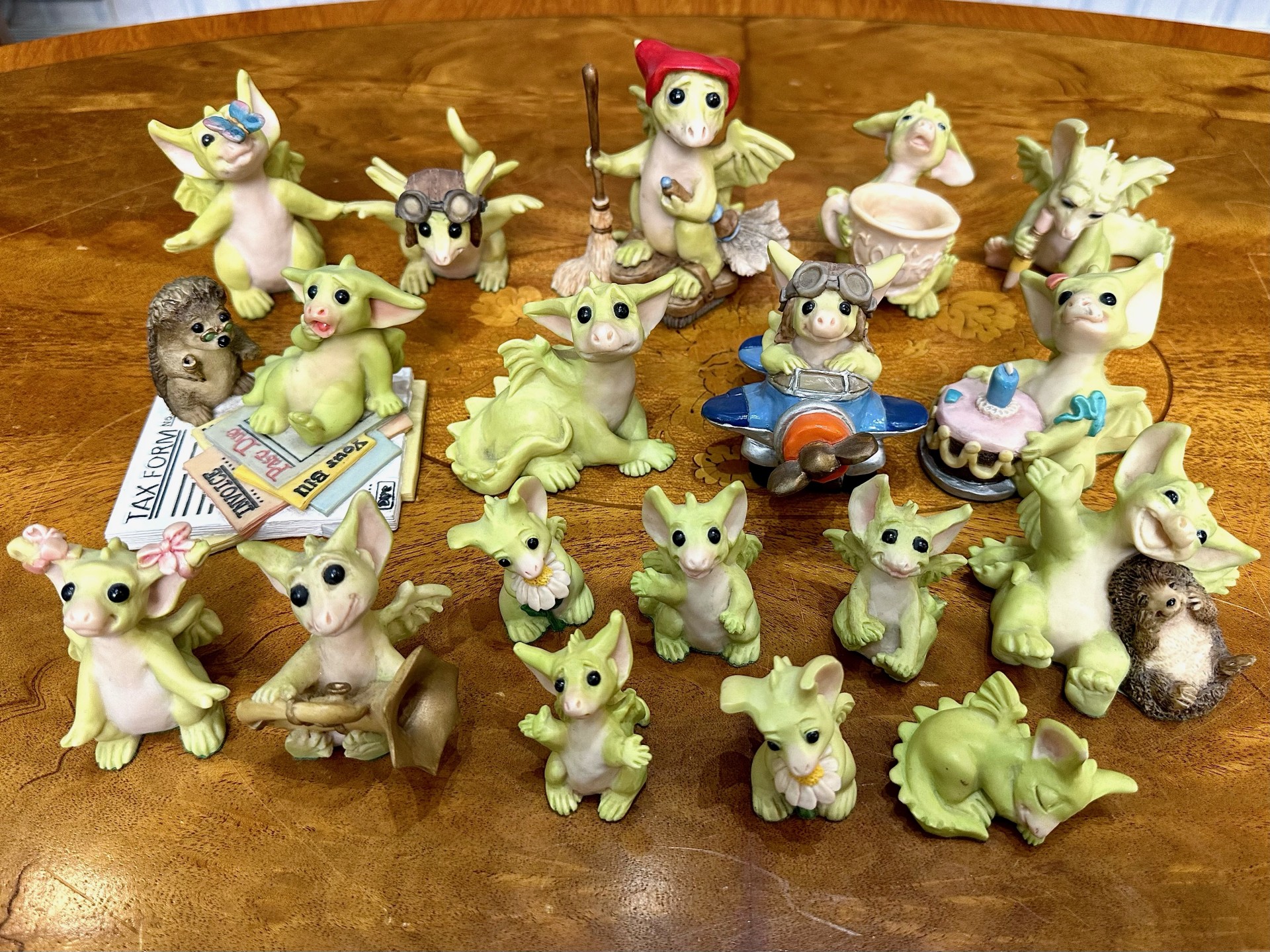 Box of 18 'Whimsical World of Pocket Dragons', assorted dragon figures.