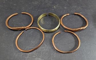 Five Hand Made Copper & Brass African Bangles, assorted finishes.