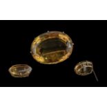 Antique Period Impressive 9ct Gold Citrine Set Brooch of large proportions and of oval form,