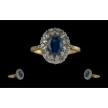 Ladies 18ct Gold Blue Sapphire and Diamond Set Cluster Ring, Flower head Design. Full Hallmark to