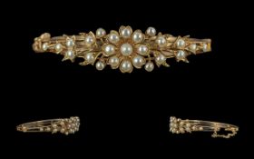 Victorian Period 1837 - 1901 15ct Gold Exquisite Pearl Set Hinged Bangle. Marked 15ct. The Well