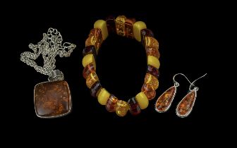 Set of Amber Jewellery, comprising a tri-colour expanding bracelet, a square pendant suspended on