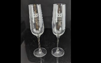 Pair of Dartington Glass Champagne Flutes engraved 'To Commemorate the engagement of HRH Prince