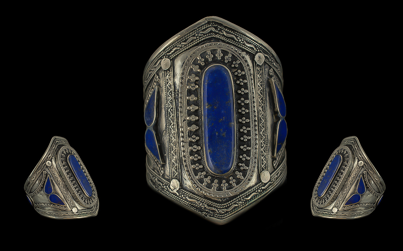 Large Lapis Cuff, white metal. Large oval Lapis set in wide white metal bangle decorated with