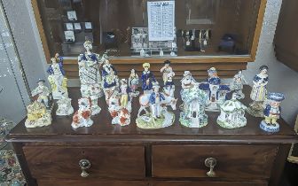 Quantity of Staffordshire Figures & Associated, Spaniels, houses figures, whole mixed lot to sort.