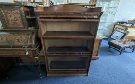 The Lebus Bookcase - Oak Three-Tier Barrister's Bookcase, typical form, glass fronted. Height