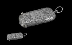 A Silver Combination Vesta & Sovereign Case, all over engraved decoration,