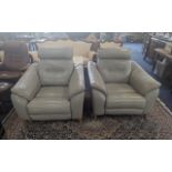 Two Electric Reclining Chairs, grey leather armchairs.