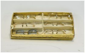Box Containing A Collection Of Mid 20thC