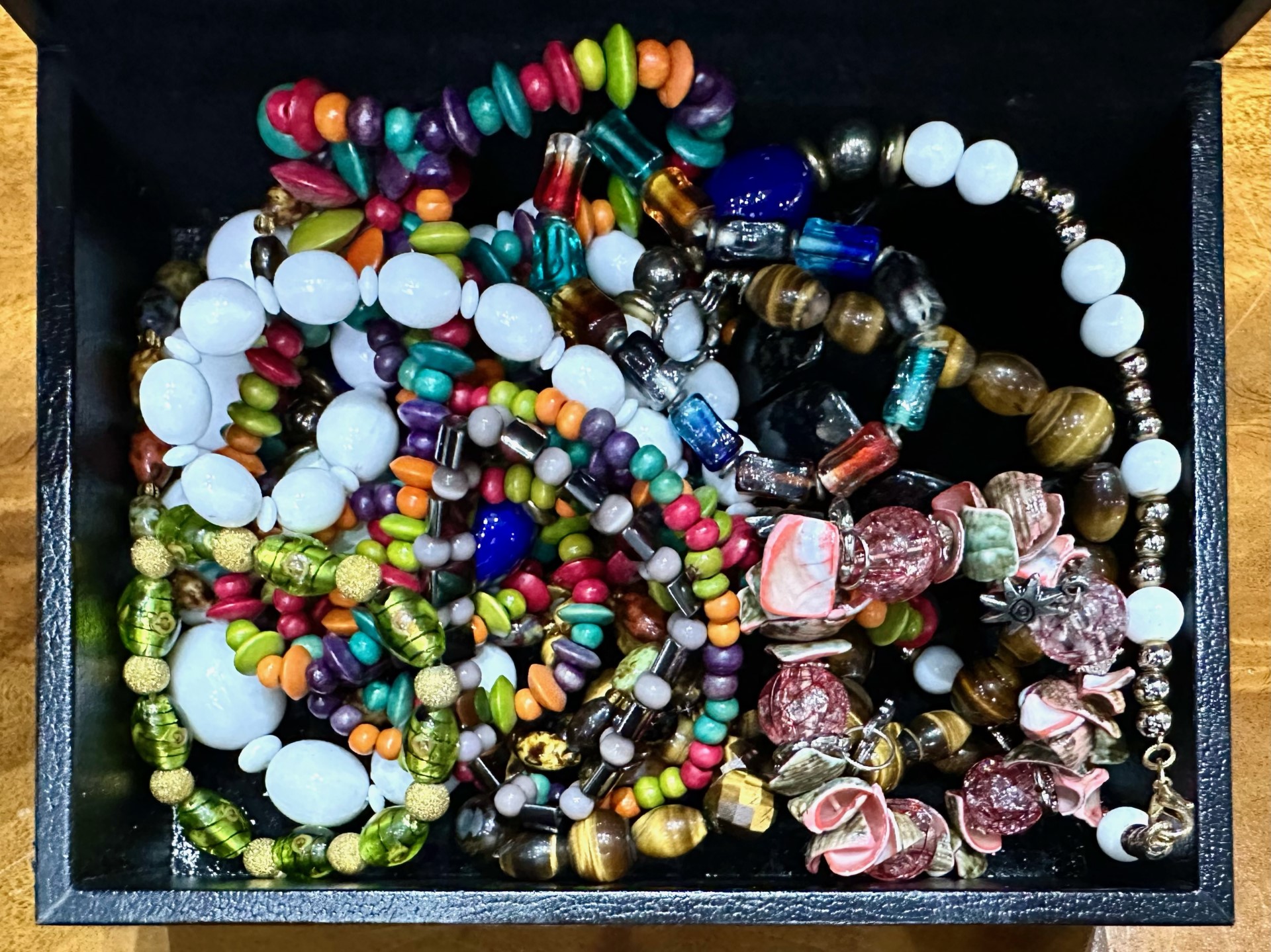 Box of Costume Jewellery, comprising assorted coloured beads, bracelets, etc., housed in a black - Image 2 of 4