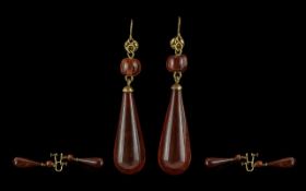 Ladies Fine Quality Pair of 14ct Gold Tear Drop Amber Set Earrings. marked 14ct to each earrings.