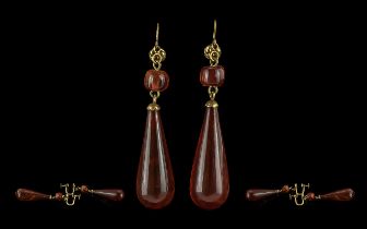 Ladies Fine Quality Pair of 14ct Gold Tear Drop Amber Set Earrings. marked 14ct to each earrings.