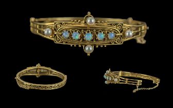 Victorian Period 1837 - 1901 14ct Gold Ornate Openwork Opal and Pearl Set Hinged Bangle of wonderful