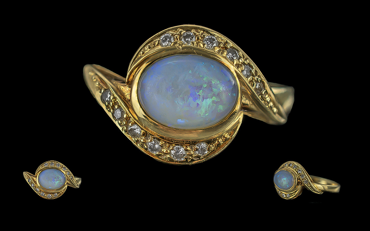 Ladies - Attractive 14ct Gold Opal and Diamond Set Ring, marked 585 - 14ct to shank, the oval shaped