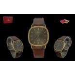 Omega Deville Gents Gold on Steel Cased Quartz Wristwatch, Cal. 1365. Features black dial, gold