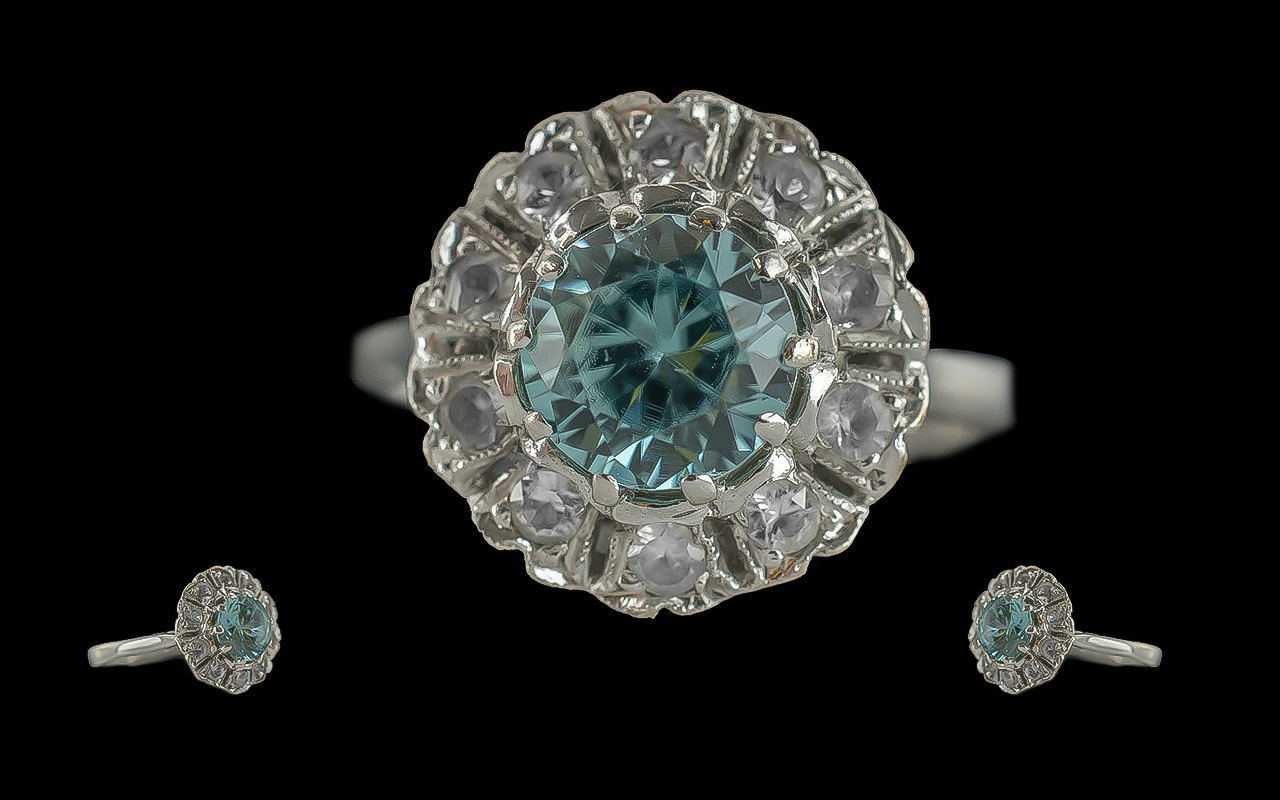 Ladies attractive 9ct white gold aquamarine and diamond set cluster ring, marked 9ct to shank. the